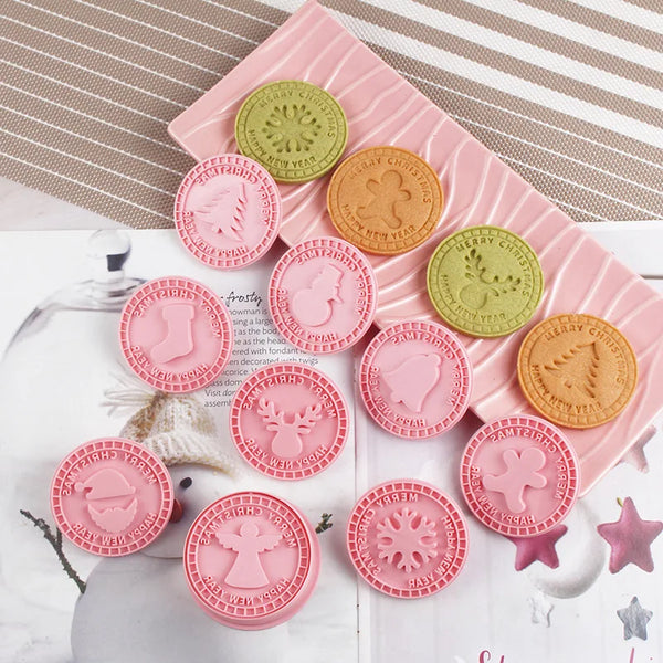 Kerstkoekjesvormen bakset